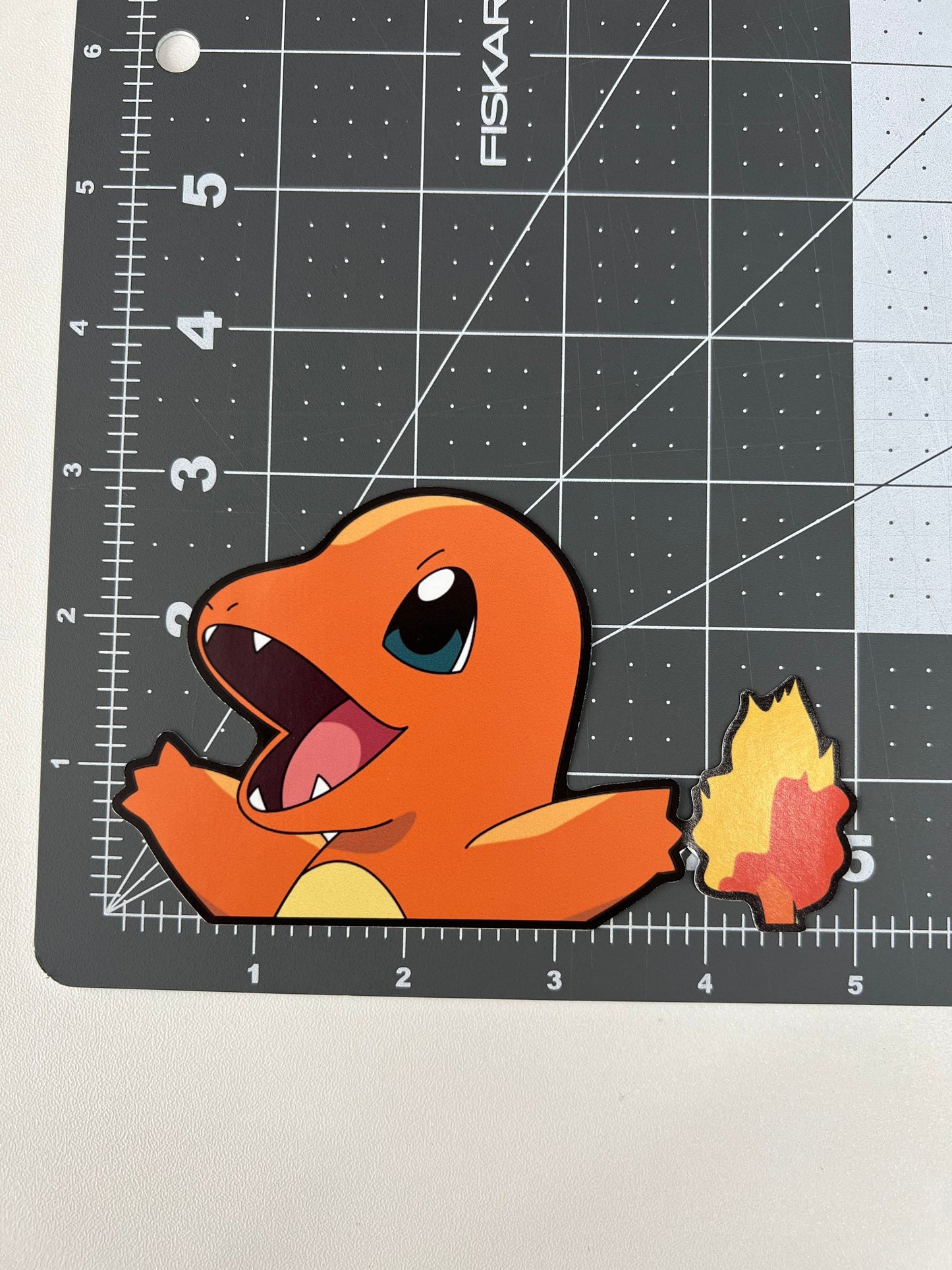 Charmander Peeker Sticker, Waterproof, anti-fading, Perfect for cars, laptops, windows and more! Pokémon