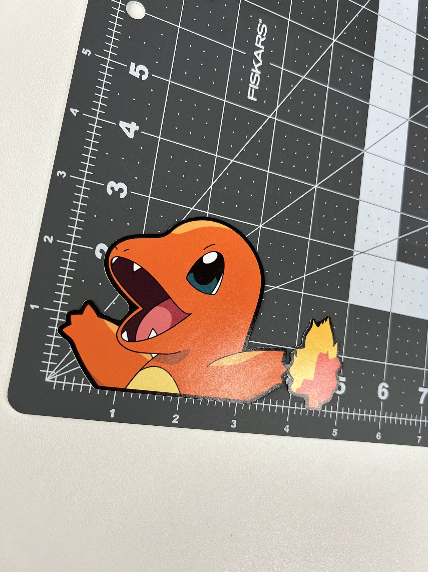 Charmander Peeker Sticker, Waterproof, anti-fading, Perfect for cars, laptops, windows and more! Pokémon