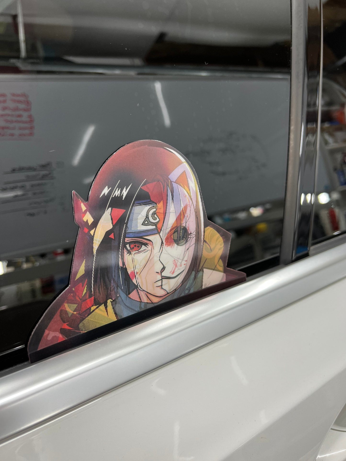 Itachi Uchiha Motion Peeker Sticker, Waterproof, anti-fading, Perfect for cars, laptops, windows and more! Naruto