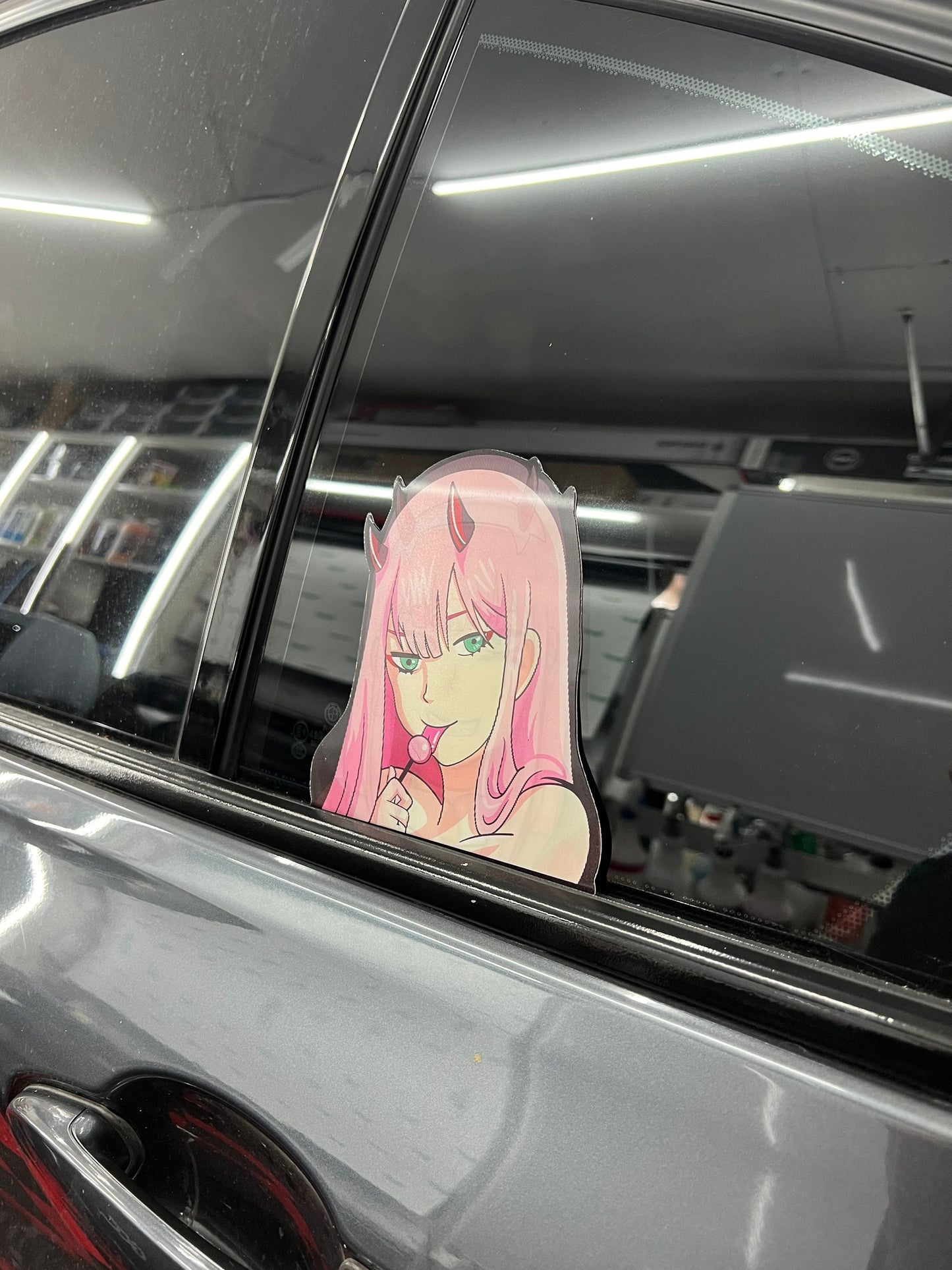 Zero Two Motion Peeker Sticker, Waterproof, anti-fading, Perfect for cars, laptops, windows and more! Darling in the Franxx