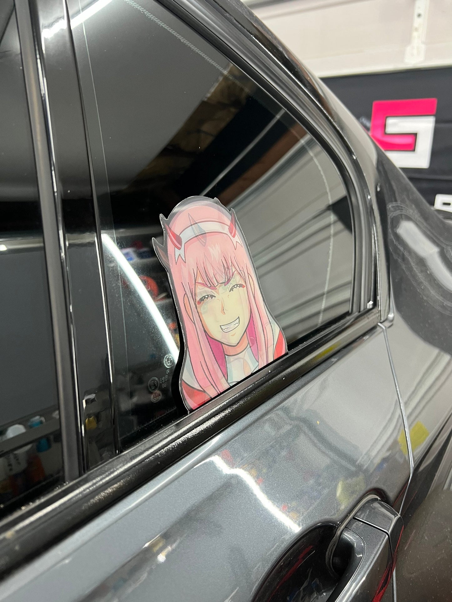 Zero Two Motion Peeker Sticker, Waterproof, anti-fading, Perfect for cars, laptops, windows and more! Darling in the Franxx